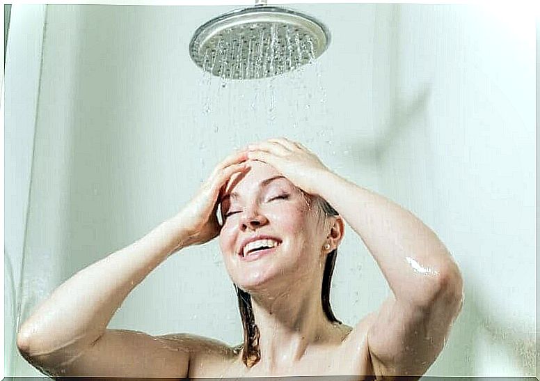 Woman under the cold shower