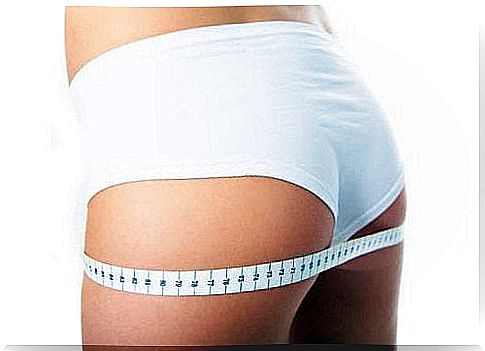 Tape measure around buttocks