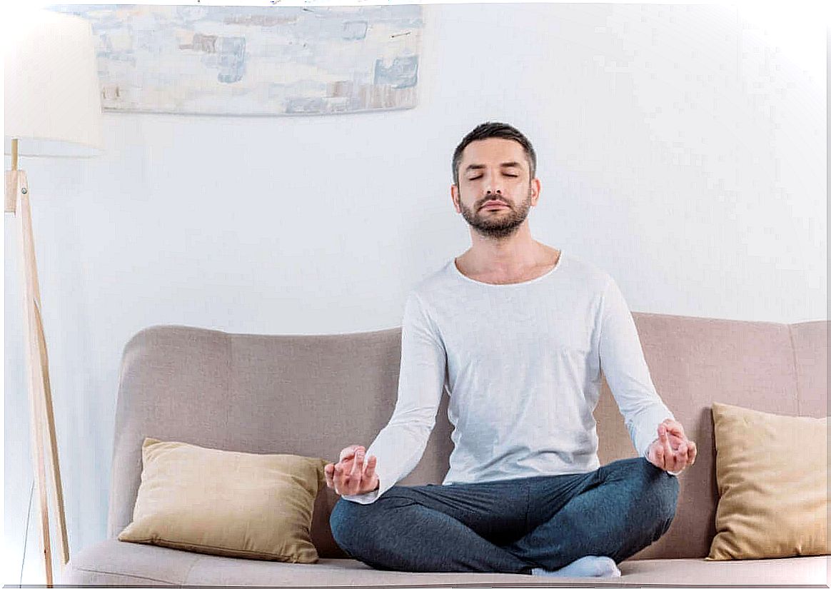 Man is meditating