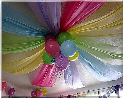 Decorate with balloons and fabrics