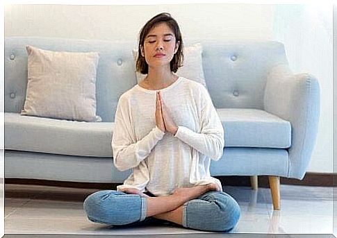 A woman meditates