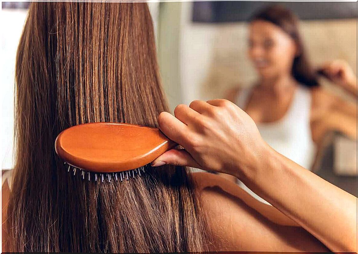 Woman brushing her hair